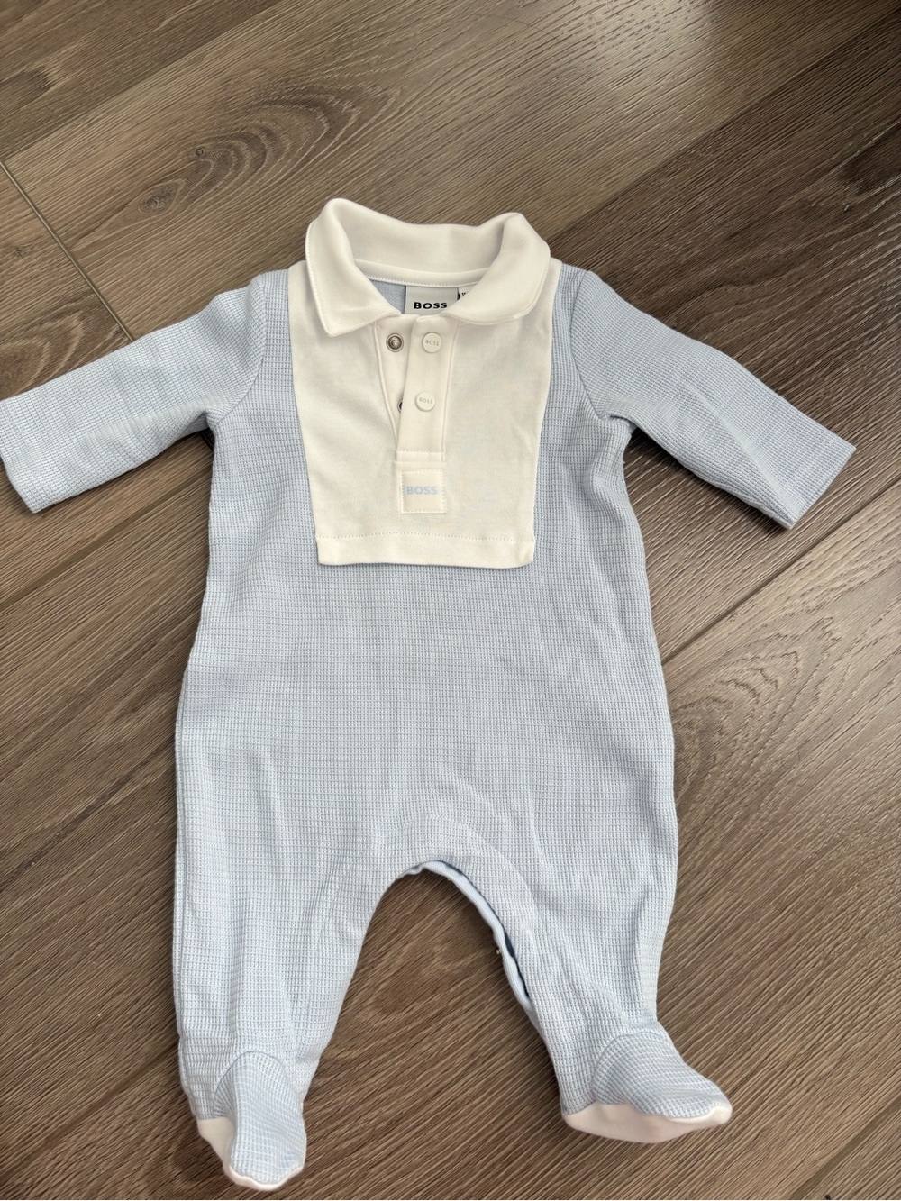 BOSS Light Blue One-Piece with Cream Polo Bib